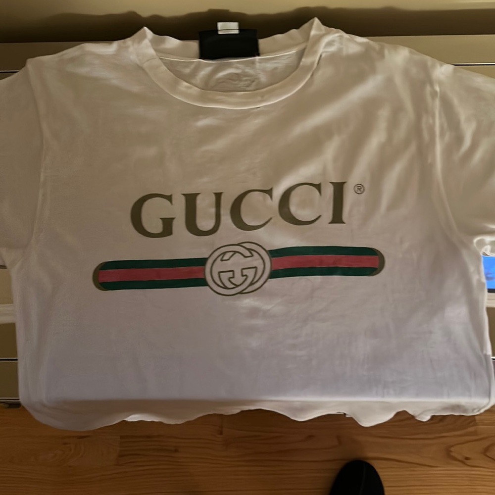 I bought it at Gucci in Boston a year ago and I wore it for two, it's like new.